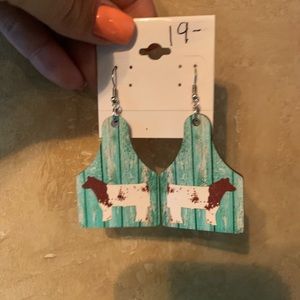 Teal cow tag style earrings